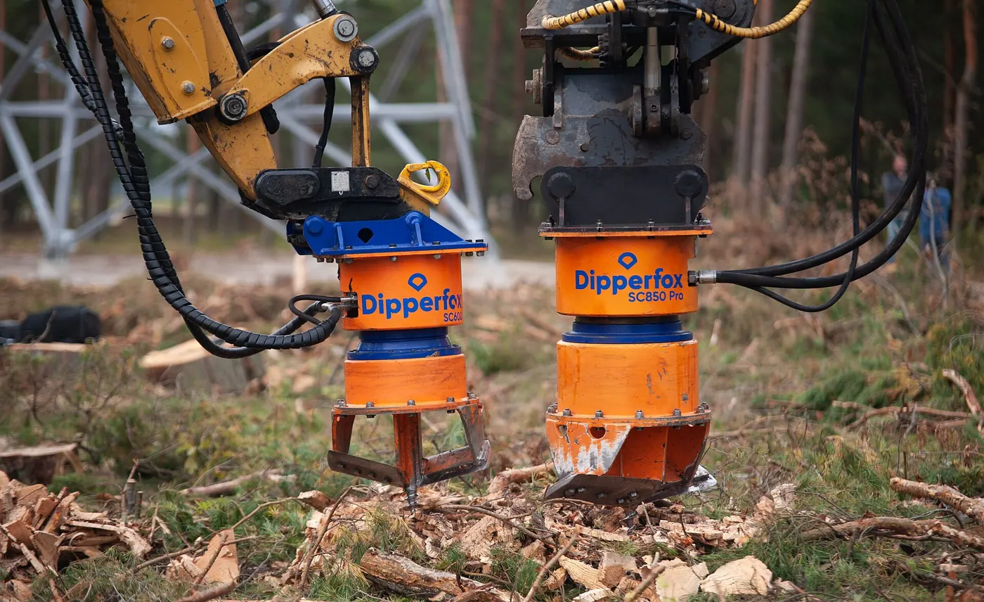 Tracked stump crusher on a cleared work area